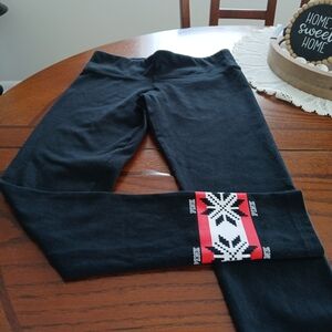 Victoria's Secret Black Leggings with Red and White Snowflake Design